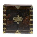A WILLIAM III BLACK JAPANNED CABINET, C1700 with engraved brass mounts, the interior fitted with