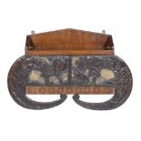 AN UNUSUAL NORSE STYLE ARTS & CRAFTS EMBOSSED BRASS MOUNTED AND STUDDED OAK MURAL CUPBOARD, C1910