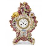 AN ENGLISH PORCELAIN FLORAL ENCRUSTED AND PAINTED CLARET GROUND MANTLE CLOCK, C1840 with French
