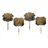 TWO PAIRS OF VICTORIAN PAPIER MÂCHÉ HAND SCREENS painted with flowers and gilt with tendrils, turned