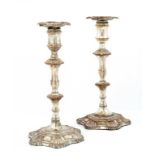 A PAIR OF SHEFFIELD PLATE CANDLESTICKS, C1765 with six shell foot, nozzles, 25cm h ++Light wear,
