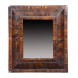 A CHARLES II OYSTER OLIVEWOOD CUSHION FRAMED MIRROR, C1680 45 x 39cm ++Originally with a cresting,