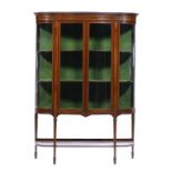 AN EDWARD VII BREAKFRONT MAHOGANY CHINA CABINET, C1910 crossbanded in satinwood and line inlaid,