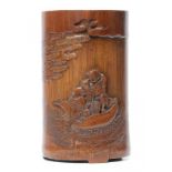 A CHINESE BAMBOO BRUSH POT, QING DYNASTY, 19TH C carved with two figures afloat in a lotus, the