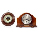 A VICTORIAN TURNED WALNUT ANEROID BAROMETER, 23CM DIAM, CIRCA 1900 AND A 1930'S WALNUT MANTLE CLOCK