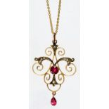 A SYNTHETIC RUBY, SPLIT PEARL AND GOLD OPENWORK PENDANT, MARKED 9CT, CIRCA 1910, AND A GOLD NECKLET,