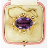 AN AMETHYST, SPLIT PEARL AND GOLD BROOCH, MARKED 15CT, CIRCA 1900
