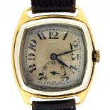 A SWISS 18CT GOLD CUSHION SHAPED GENTLEMAN'S WRISTWATCH, THE CASE BACK ENGRAVED WITH INITIALS AND