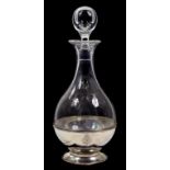 A SCOTTISH ELIZABETH II SILVER MOUNTED GLASS BALUSTER DECANTER AND STOPPER ENGRAVED WITH THE BADGE