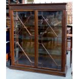 AN EARLY 20TH CENTURY MAHOGANY GLAZED BOOKCASE 144CM X 122CM