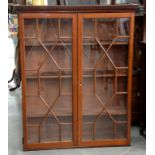 A MAHOGANY GLAZED BOOKCASE 123CM X 101CM X 25CM