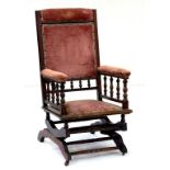 A MAHOGANY AMERICAN ROCKING CHAIR