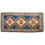 A RUG, 195CM X 91CM AND ANOTHER A RUG, 228 X 130CM