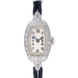 A DIAMOND TONNEAU FORM COCKTAIL WATCH, C1940 in platinum with Vertex movement ++In apparently good