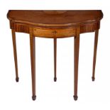 AN EDWARD VII SATINWOOD AND INLAID = CARD TABLE, C1905 with penwork detail and fitted with a