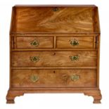 A GEORGE III MAHOGANY BUREAU, C1780 with crisply carved, serpentine fitted interior, 111cm h; 56 x