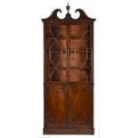 A GEORGE III MAHOGANY BOOKCASE, C1800 fitted with adjustable shelves, the sides of stained pine,