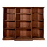 A VICTORIAN MAHOGANY BREAKFRONT BOOKCASE, C1880 with adjustable shelves, 145cm h; 37 x 183cm ++Minor