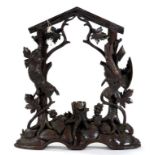A GERMAN CARVED WOOD RUSTIC CUCKOO CLOCK SURROUND WITH HANGING GAME, 45CM H, LATE 19TH CENTURY