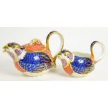 A ROYAL CROWN DERBY IMARI QUAIL TEAPOT AND COVER AND CREAM JUG EN SUITE, TEAPOT AND COVER 13CM H,