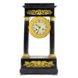 A LOUIS PHILLIPPE BRASS MOUNTED AND EBONISED WOOD PORTICO CLOCK THE MOVEMENT WITH OUTSIDE COUNT