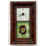 AN AMERICAN MAHOGANY WALL CLOCK WITH PAINTED METAL DIAL AND FLORAL PAINTED GLASS PANEL TO THE