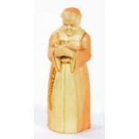 A ROYAL WORCESTER FIGURAL CANDLE SNUFFER IN THE FORM OF A MONK 12.5CM H PUCE PRINTED MARK CIRCA