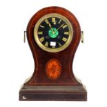 AN INLAID MAHOGANY BALLOON CASED MANTLE CLOCK WITH MALACHITE CENTRED SLATE DIAL, THE FRENCH MOVEMENT