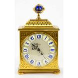 A BAUER BRASS AND BLUE ENAMEL BASKET TOPPED MANTLE CLOCK THE CASE SURMOUNTED BY AN HOROLY, 25CM H