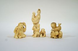 Three late 19th century Japanese carved ivory okimono's of a boy with a toad, 3.