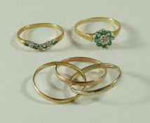 A diamond and emerald 9 carat gold cluster ring,