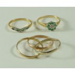 A diamond and emerald 9 carat gold cluster ring,