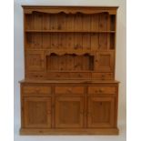 A late 20th century pine dresser,