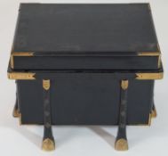 A Japanese black lacquer chest with gilt metal mounts on flared feet, 31cm high, 43cm wide,