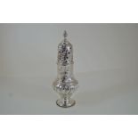 A Victorian silver caster, by Daniel & John Welby, London 1887, of embossed baluster form,