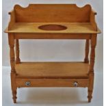 A Victorian pine wash stand with shaped raised back and sides,