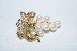 A cultured pearl fruiting vine brooch,