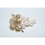 A cultured pearl fruiting vine brooch,