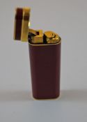 A Cartier cigarette lighter,