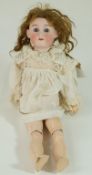 A late 19th century Heinrich Hanwerck bisque headed doll, with sleeping blue eyes,