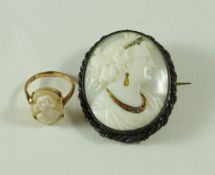 A habille cameo brooch, the female profile with a tiara, and necklace,