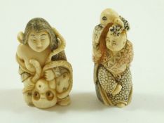 An early 20th century Japanese carved ivory and stained okimono of a lady holding an octopus 4.