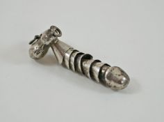 A silver coloured articulated male genitalia charm/pendant,