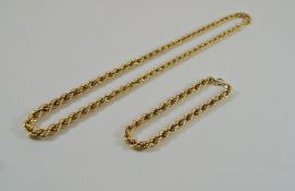 A necklace and matching bracelet, stamped '14K', of hollow rope links,