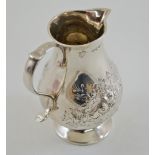 A silver cream jug, by Frazer & Haws, London 1870, of baluster sparrow beak form,