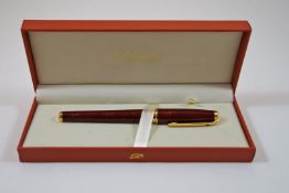 S T Dupont (1990's) Olympio "Gold Dust" red lacquer roller ball,