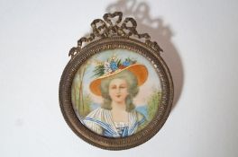 Continental School
Portrait miniature of a lady wearing a hat with flowers
Watercolour
4.
