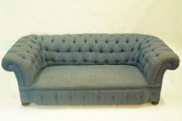A Victorian button back sofa, upholstered in blue, 71cm high,