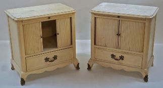 A pair of painted and metal mounted bedside cabinets,