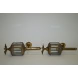 A pair of brass carriage style lamps, each with eagle finial, 36.